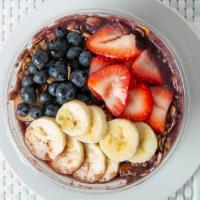 Acai Bowl · Almond milk, banana, frozen blueberries and strawberries. Topped with granola, strawberries,...