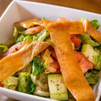 Fattoush · Vegetarian. Mixture of greens with cucumber, tomatoes, onions, mint, bell peppers, sumac and...