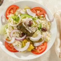 Greek Salad(Medium) · Romaine and iceberg lettuce, cucumbers, peppers, tomato, onions, olives, Feta, and our own s...