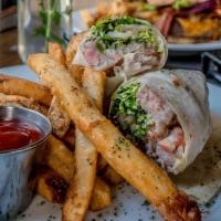 Tuna Steak Wrap · Served with lettuce and tomato in a flour tortilla wrap with wasabi mayo.