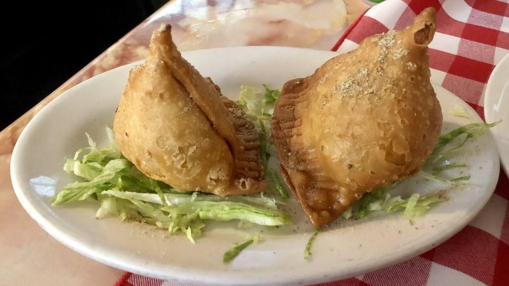 Chicken Samosas · Hungry Bird favorite: India's most popular snack - pastry with a filling of minced masala chicken.