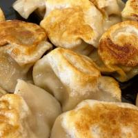 Bao Sampler Platter  · 12 of our best selling pan-fried dumplings :
4 Pork w. Scallion; 4 Chicken w. Corns; 4 Beef ...