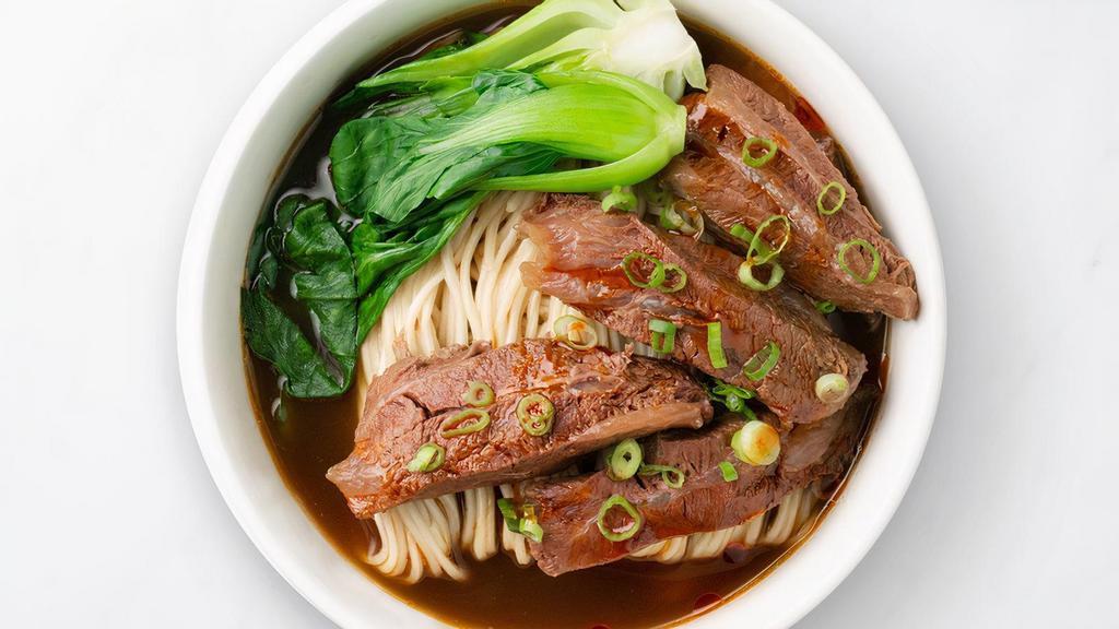Braised Beef Noodle Soup 紅燒牛肉麵 · Braised beef served with noodles and bok choy in a slow-cooked deep flavor broth.
