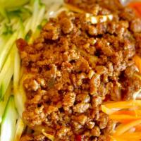 Noodles With Minced Pork Sauce 炸醬麵 · Cold noodles with hot house special minced pork sauce topped with thinly cut cucumber and ca...
