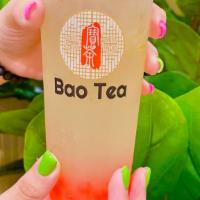 Lychee Legend · Jasmine green tea with lychee syrup and freshly squeezed lemon juice, topped with strawberry...