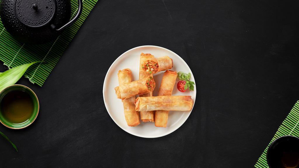 Spring Conquer Roll · Vegetables wrapped in broad rice noodle.