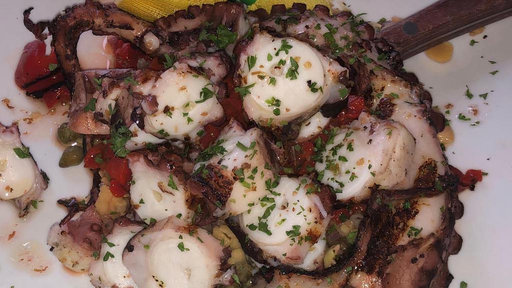 Grilled Octopus · Chickpea, onion, capers and roasted red pepper.