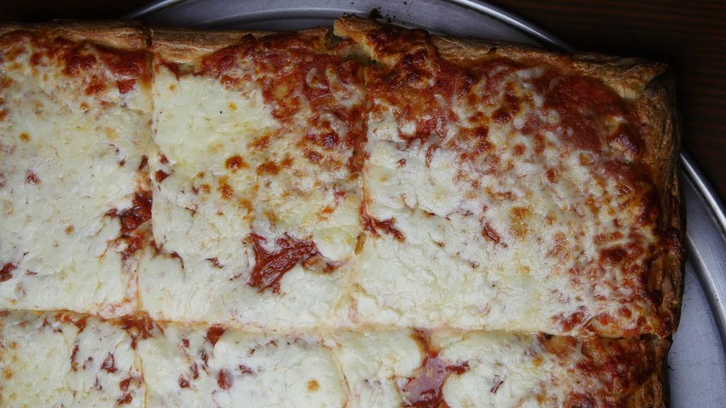 Sicilian Pizza · Large. Thick pan pizza topped with tomato sauce and mozzarella cheese. Classic cheese or create your own pizza.