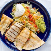 Fajita Quesadilla · Tortilla with choice of steak or grilled  chicken stuffed with onions,peppers and tomato ser...