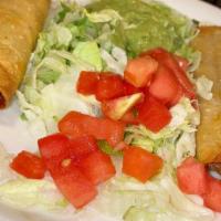 Flautas Mexicanas · Four chicken or shredded beef flautas topped with sour cream, fresh queso served with Mexica...