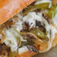 Philly Cheese Steak · Grilled roast beef w fried onions, mozzarella & brown gravy