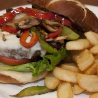 House Burger · Made with 100% fresh beef & mushrooms, onions, and melted Swiss cheese