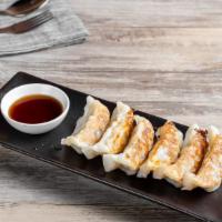 Gyoza · Pan-fried pork dumplings. Dumpling with a minced filling.