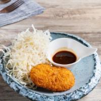 Crab Croquette · Rolled in breadcrumbs and fried.