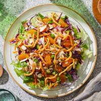 Chinese Chicken Salad · Shredded chicken over shredded cabbage and carrots with mandarin oranges, sesame seeds, gree...
