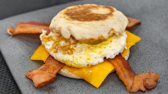 Bacon And Egg Sandwich · Bacon, fresh egg, and cheddar cheese on an english muffin.