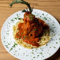 Osso Bucco · Pork shank braised in our homemade red wine tomato ragu served with linguini.