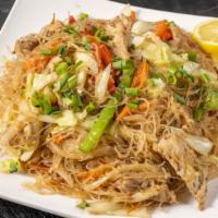 Pancit Bihon · Translucent Rice noodles with assorted vegetables. Your choice of protein.