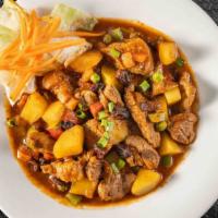 Pork Menudo · Tomato base stew chunks of pork, peas, carrots, potatoes, and seasonings. Served with choice...