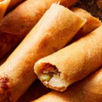 Shanghai Lumpia ( Ground Pork Egg Rolls-12 Pieces) · Minced pork with water chestnut, onion, carrots and seasoning. wrapped in spring roll wrappe...