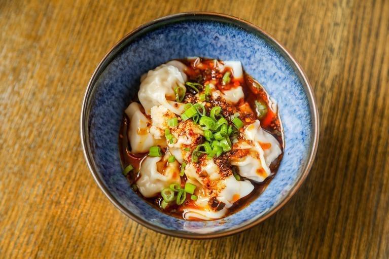 Ma-La Szechuan Wonton麻辣抄手 · Steam mini wonton mixed with house special sweet and spicy sauce, top with peppercorn oil, garlic paste, and chili paste.