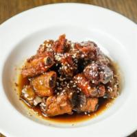 Sweet & Sour Baby Ribs糖醋排骨 · Small cut rib with sweet and sour sauce