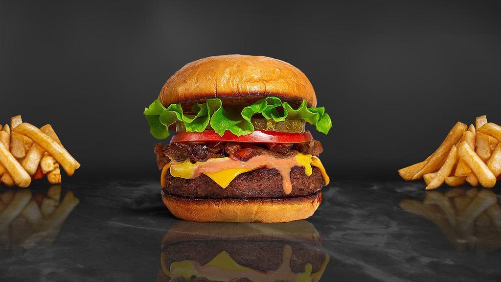 Classic Burger · Half pound beef patty topped with lettuce, tomato, onion, and pickles. Served on a warm bun.