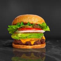 Avocado Burger · Half pound beef patty topped with avocado, melted cheese, lettuce, tomato, onion, and pickle...