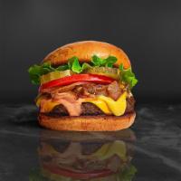 Veggie Burger · (Vegetarian) Black bean patty topped with melted cheese, grilled onions, dill pickles, lettu...
