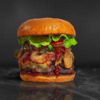 Bbq Burger · Half pound beef patty topped with melted cheese, barbecue sauce, lettuce, tomato, onion, and...