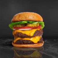 Cheese Double Burger · Two Half pound beef patties topped with melted cheese, lettuce, tomato, onion, and pickles. ...