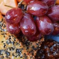 Sesame Crusted Feta. · fresh fruit, fig, honey