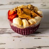 Peanut Butter Acai Bowl · Organic Acai Blended with Banana Strawberry peanut and Almond Milk
Toppings Granola Strawber...