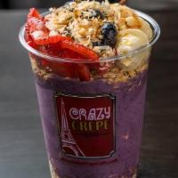 Acai Bowl · Topped with blueberries, strawberries, bananas, granola, honey, toasted coconut.