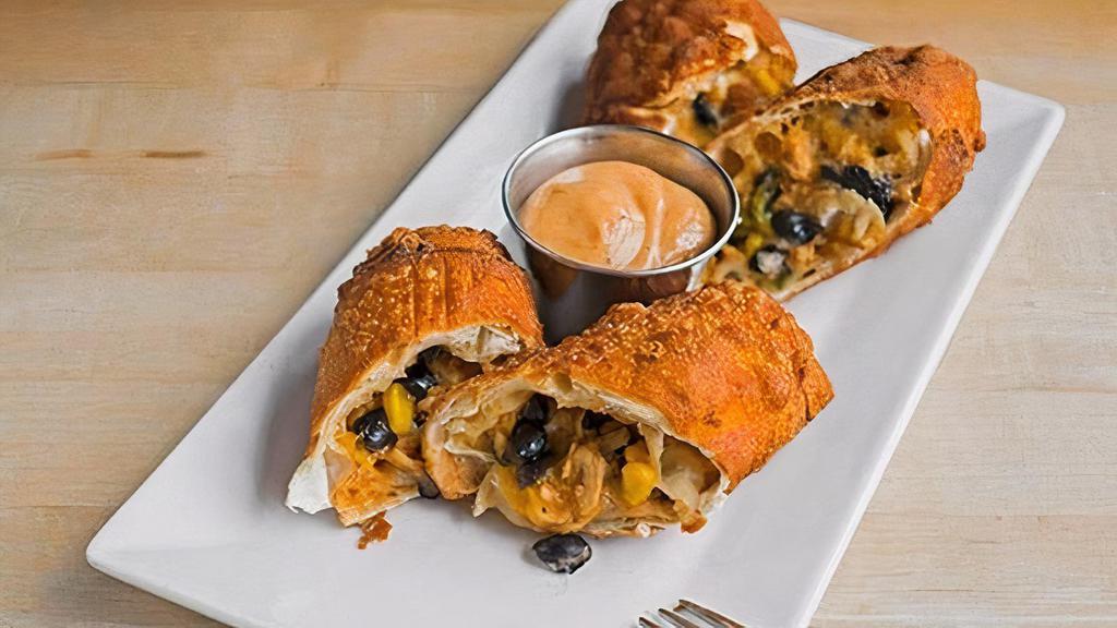 Southwest Chicken Spring Rolls · Black beans and cheddar.