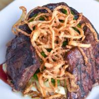 Marinated Skirt Steak · Yukon whipped potatoes, sautéed garlic spinach, crispy vidalia onion