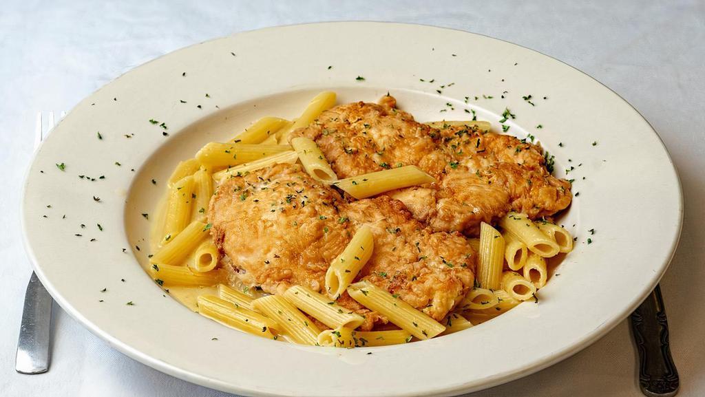 Chicken Francese · Chicken breast sautéed with white wine, butter and lemon.