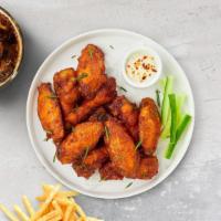 6-Piece Wings · Fresh chicken wings fried until golden brown. Your choice of one flavor.