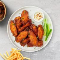 12-Piece Wings · Fresh chicken wings fried until golden brown. Your choice of one flavor.
