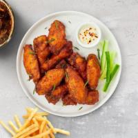 25-Piece Wings · Fresh chicken wings fried until golden brown. Your choice of two flavors.