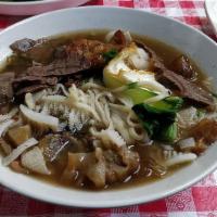 House Special Combo · Beef, beef tripe, beef tendon, pork chop, and egg. Your choice of noodle and soup.