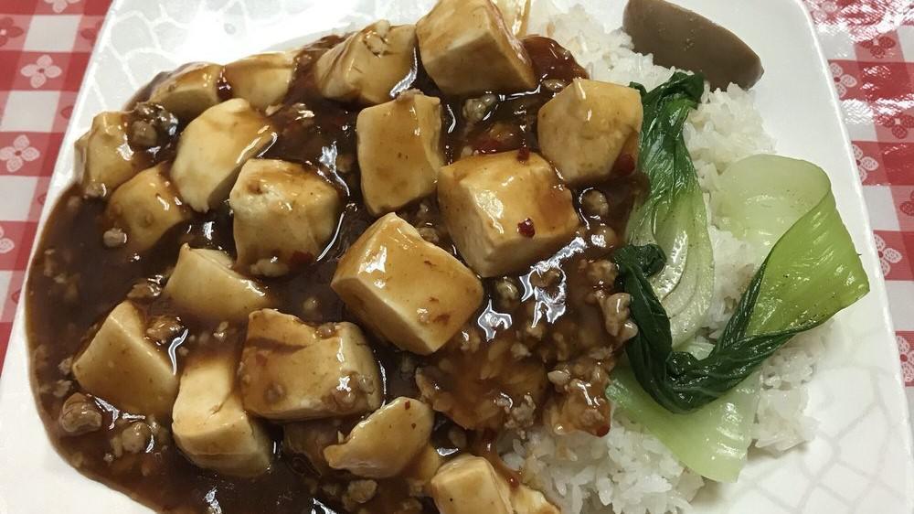 Ma Po Tofu · Spicy. Served with white rice, green vegetable, and soy egg.