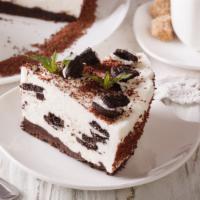 Oreo Cheesecake · A rich and creamy cheesecake baked with oreos inside a honey-graham crust.