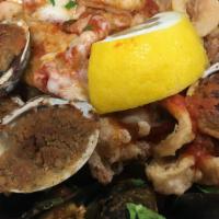 Hot Seafood Antipasto (Large) · Fried calamari, shrimp Parmigiana (two) mussels and baked clams (three). Served with marinar...