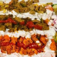 Chicken & Lamb Mix · Come with rice and chicken and lamb mix salad 
Lettuce tomato cucumber green olives black ol...