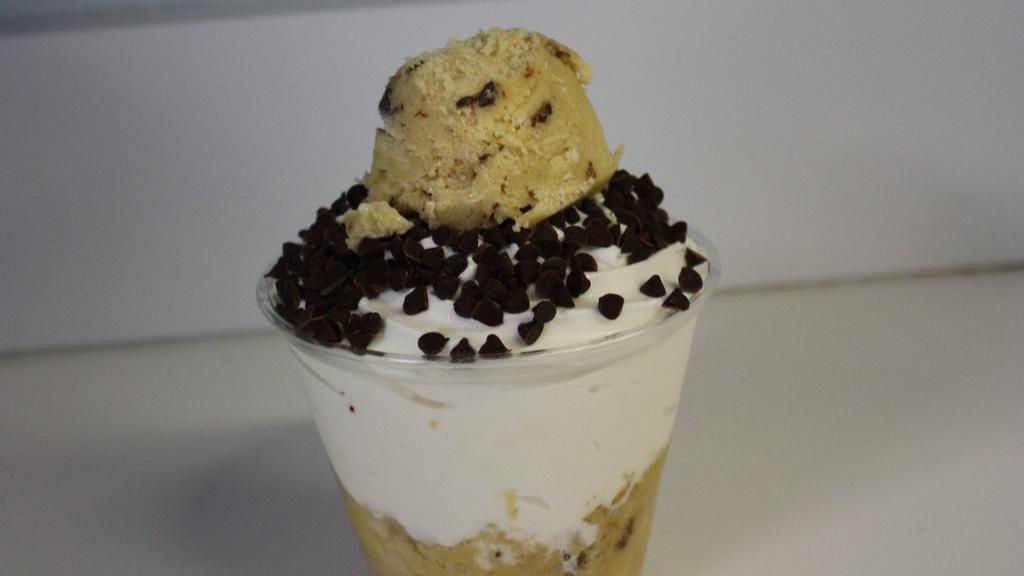 Chocolate Chunk Doughnado · Chocolate Chunk Cookie Dough layered between soft serve ice cream topped with chocolate chips!