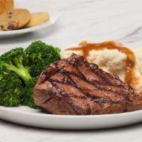 Sirloin Steak · Our hand-cut signature Sirloin Steak, marinated and grilled to perfection. Served with two s...