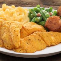 Fried Fish Family Meal  · Hand-breaded fried fish, served with lemon and tartar sauce.  Comes with 2 family sides, hal...