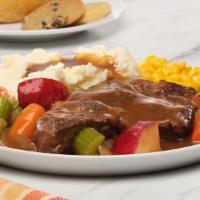 Pot Roast With Veggies · Our Pot Roast is slow-cooked overnight for awesome tenderness. Served on a bed of potatoes, ...