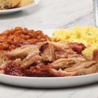 Pulled Pork · Our Pulled Pork is roasted overnight and hand-shredded and sauced. Served on a bed of white ...